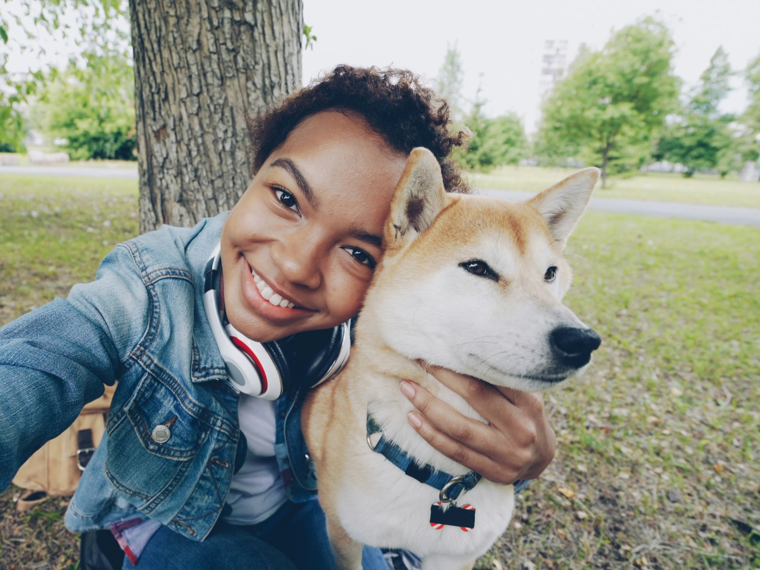 Change of Address Form Banner Happy lady with her pet dog sitting with her pet dog