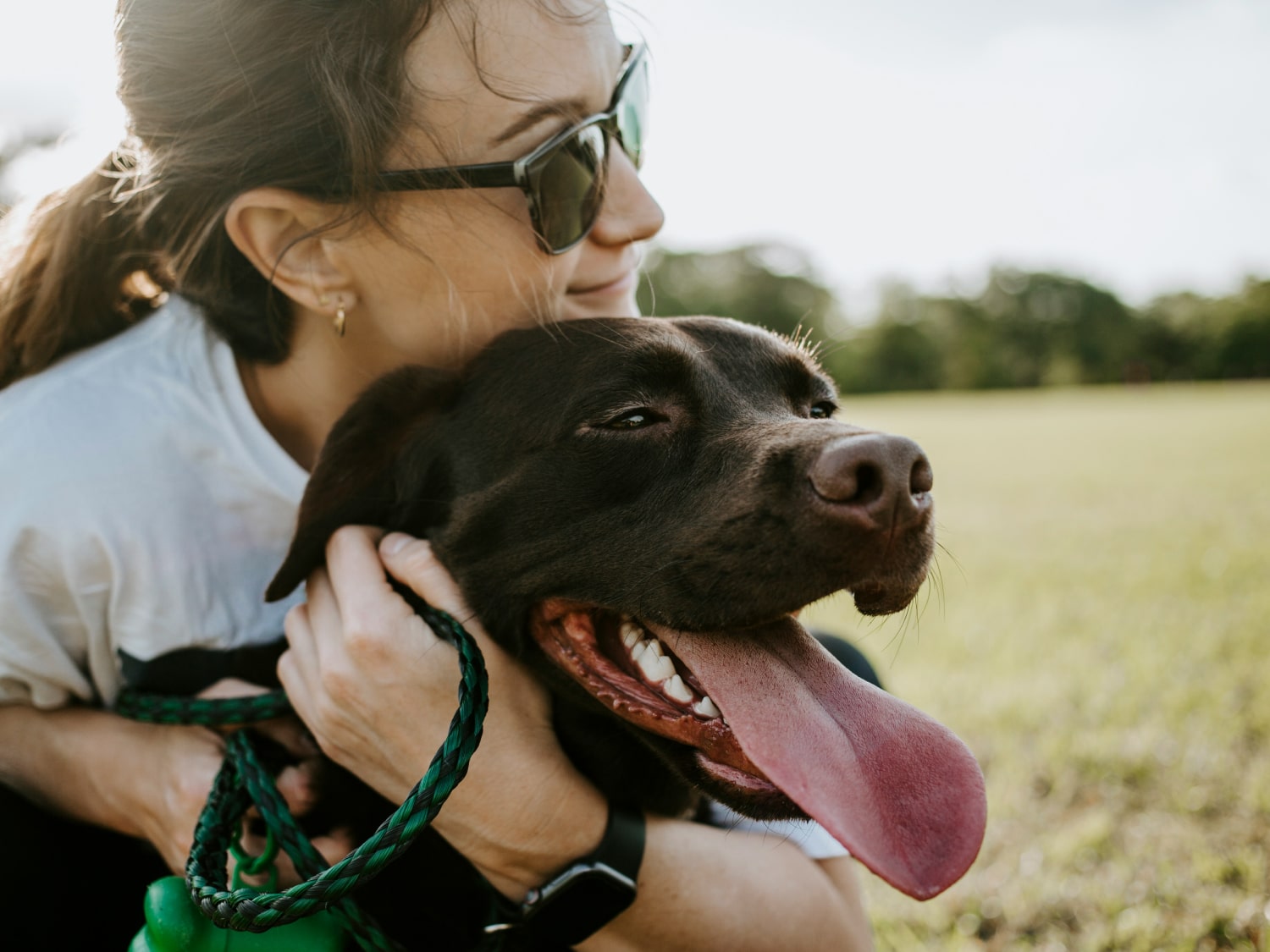 Payment Options Banner Girl with sunglasses hugging her pet dog with love